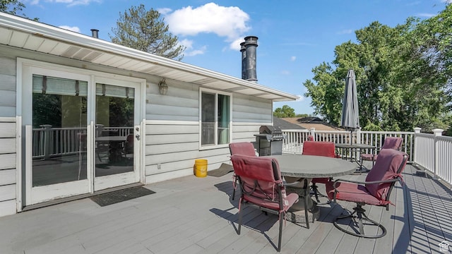 7505 S Creek Rd E, Cottonwood Heights, UT 84093 - wooden deck with outdoor dining space and grilling area