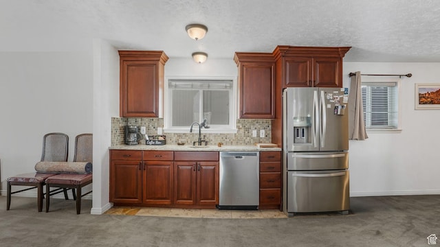 7505 S Creek Rd E, Cottonwood Heights, UT 84093 - kitchen featuring appliances with stainless steel finishes, a sink, light colored carpet, backsplash, and a textured ceiling