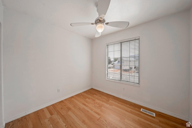 4213 S 2850 W, Roy, UT 84067 - spare room with light wood-style flooring, ceiling fan, and baseboards