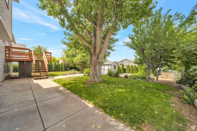 4213 S 2850 W, Roy, UT 84067 - view of green lawn with stairway, a patio area, and a deck