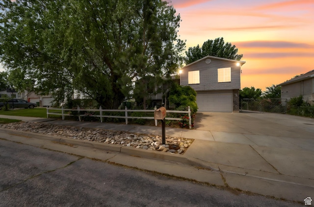 4213 S 2850 W, Roy, UT 84067 - view of front facade featuring concrete driveway and a garage