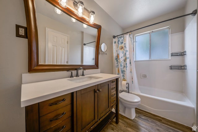 4213 S 2850 W, Roy, UT 84067 - bathroom with vanity, toilet, wood finished floors, and shower / bath combo with shower curtain