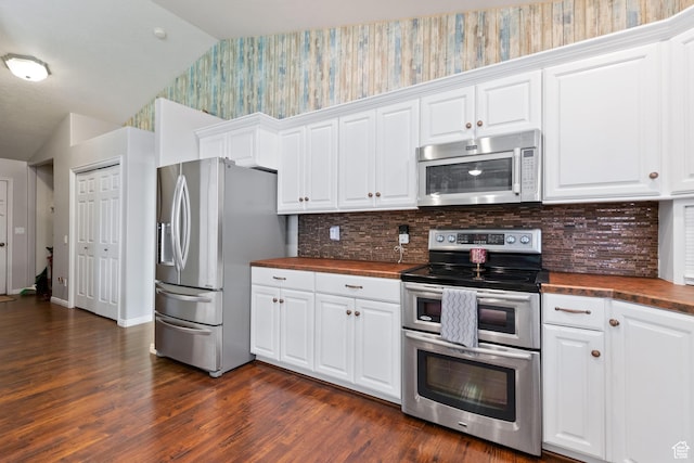 1092 S 470 E, Providence, UT 84332 - kitchen with stainless steel appliances, wallpapered walls, wooden counters, vaulted ceiling, and dark wood-style floors