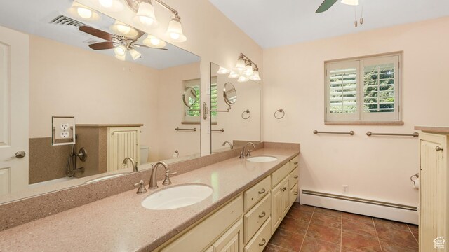 412 S 100 E, Salem, UT 84653 - full bathroom with a ceiling fan, a baseboard radiator, double vanity, and plenty of natural light