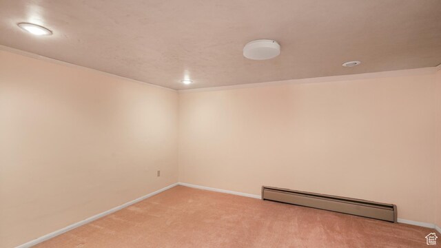 412 S 100 E, Salem, UT 84653 - empty room with baseboard heating, light carpet, baseboards, and crown molding