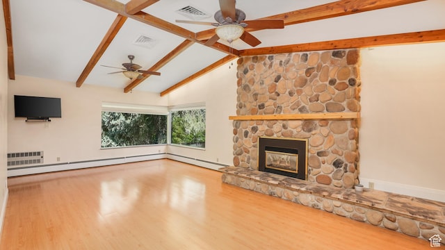 412 S 100 E, Salem, UT 84653 - unfurnished living room featuring ceiling fan, wood finished floors, a stone fireplace, and baseboards