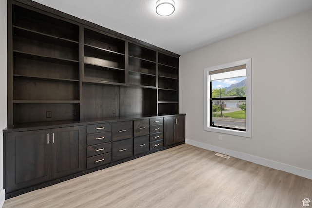 915 E 2100 N, North Ogden, UT 84414 - interior space with light wood-style flooring and baseboards