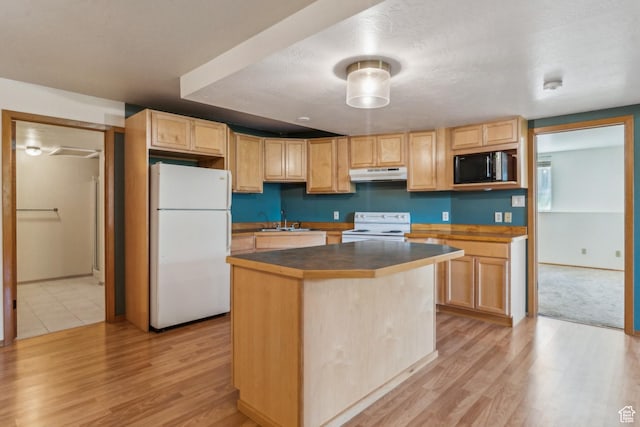 6530 Snow View Dr, Park City, UT 84098 - kitchen with white appliances, under cabinet range hood, light wood-style floors, light brown cabinetry, and a textured ceiling
