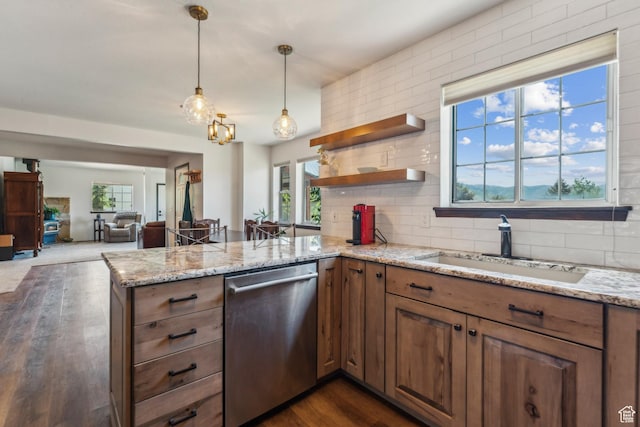 6530 Snow View Dr, Park City, UT 84098 - kitchen with dishwasher, a peninsula, dark wood-style floors, light stone counters, and tasteful backsplash