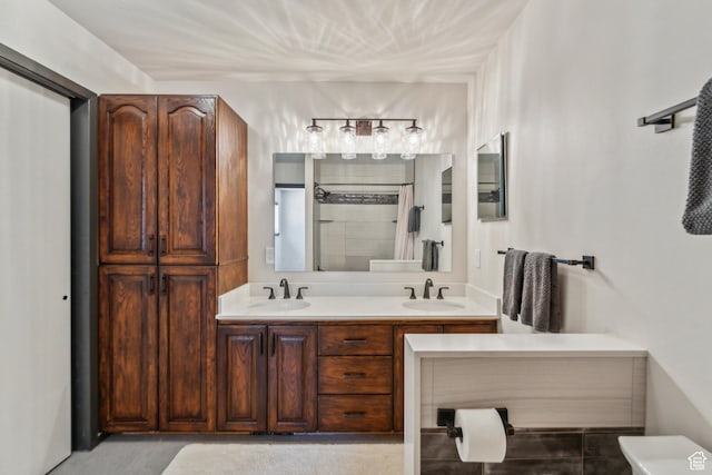 6530 Snow View Dr, Park City, UT 84098 - bathroom with double vanity, tiled shower, and toilet