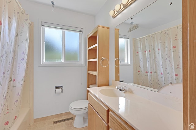2458 N 575 E, North Ogden, UT 84414 - bathroom featuring vanity, toilet, tile patterned floors, and shower / bath combo