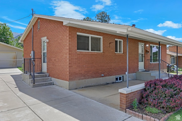 2458 N 575 E, North Ogden, UT 84414 - view of front of property with an outbuilding and brick siding