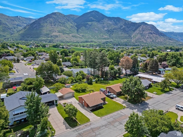 2458 N 575 E, North Ogden, UT 84414 - aerial view of residential area featuring a mountain backdrop