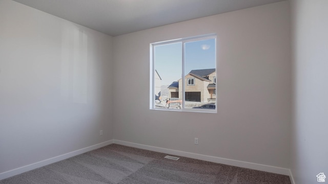 877 W Sika Cir S Unit 203, Saratoga Springs, UT 84045 - empty room with baseboards and carpet flooring