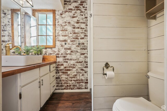 153 W 4350 N, Pleasant View, UT 84414 - bathroom with wood finished floors, toilet, and vanity