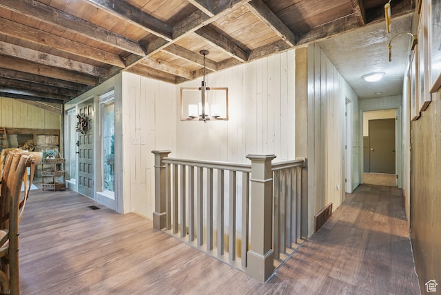 153 W 4350 N, Pleasant View, UT 84414 - corridor featuring wood finished floors, wooden ceiling with exposed beams, wooden walls, an upstairs landing, and a chandelier