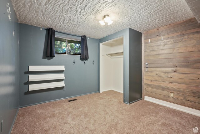 153 W 4350 N, Pleasant View, UT 84414 - unfurnished bedroom with carpet floors, baseboards, a textured ceiling, and a closet