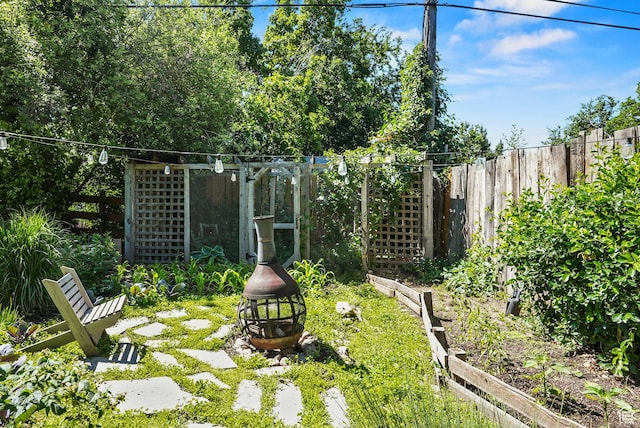 153 W 4350 N, Pleasant View, UT 84414 - fenced backyard with a garden