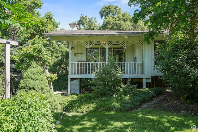 153 W 4350 N, Pleasant View, UT 84414 - view of front of property with covered porch and a chimney