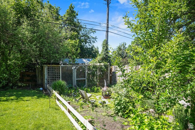 153 W 4350 N, Pleasant View, UT 84414 - view of yard with an outdoor structure