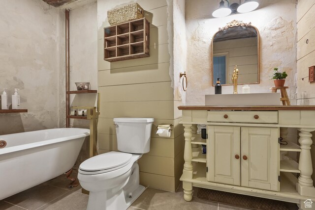 153 W 4350 N, Pleasant View, UT 84414 - bathroom featuring a soaking tub, vanity, toilet, and tile patterned floors