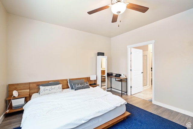 12568 S Bridal Veil Dr W, Riverton, UT 84065 - bedroom with wood finished floors, baseboards, and a ceiling fan
