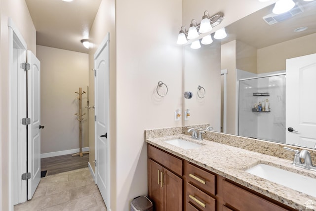 12568 S Bridal Veil Dr W, Riverton, UT 84065 - bathroom with double vanity, a stall shower, and tile patterned floors