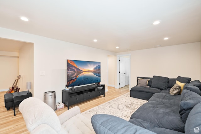 12568 S Bridal Veil Dr W, Riverton, UT 84065 - living room featuring light wood finished floors, recessed lighting, and baseboards