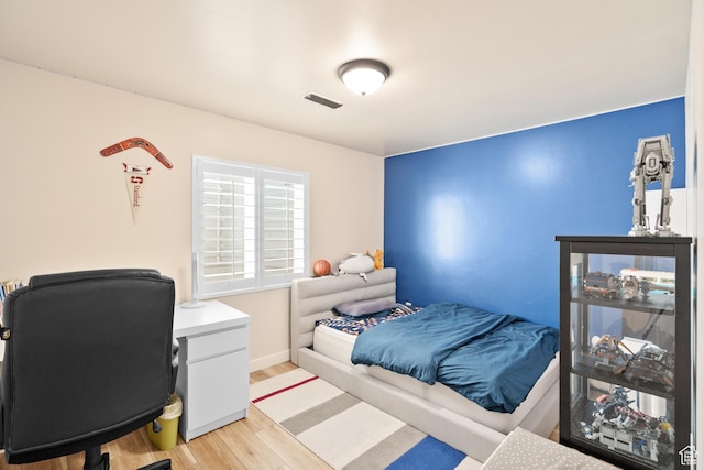 12568 S Bridal Veil Dr W, Riverton, UT 84065 - bedroom featuring light wood-style floors and a desk