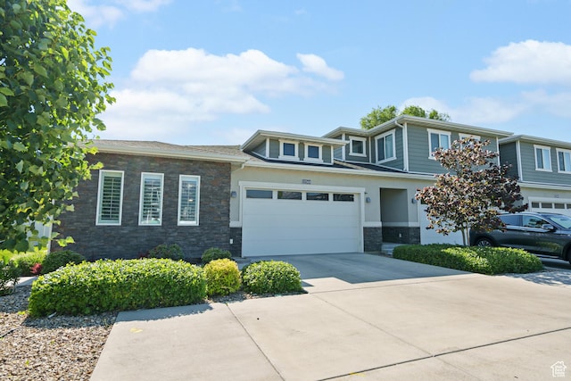 12568 S Bridal Veil Dr W, Riverton, UT 84065 - view of front of house with stone siding and driveway