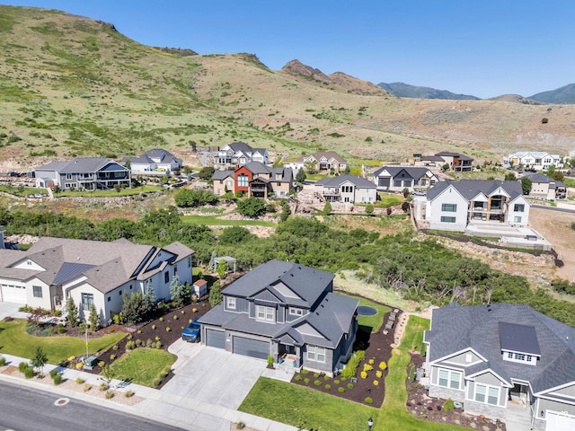 15058 S Spring Canyon Dr, Herriman, UT 84096 - aerial perspective of suburban area featuring a mountainous background