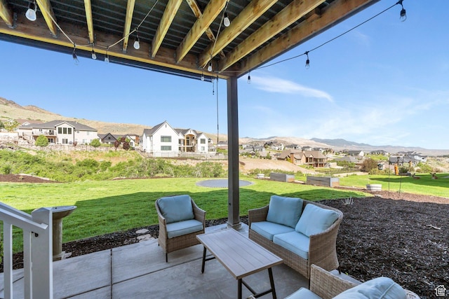 15058 S Spring Canyon Dr, Herriman, UT 84096 - view of patio / terrace featuring a residential view, a mountain view, and an outdoor hangout area