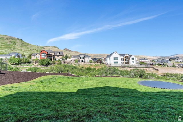 15058 S Spring Canyon Dr, Herriman, UT 84096 - view of green lawn with a residential view and a mountain view