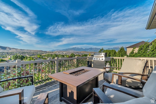 3547 E Jacobs Way, Eagle Mountain, UT 84005 - deck featuring a mountain view, an outdoor fire pit, and a grill