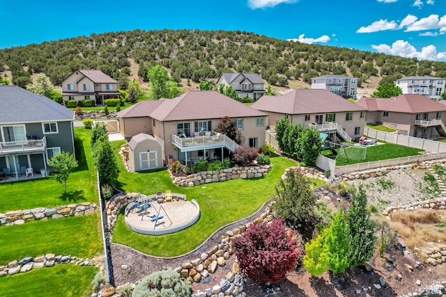 3547 E Jacobs Way, Eagle Mountain, UT 84005 - aerial view of residential area featuring a heavily wooded area