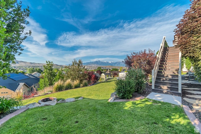 3547 E Jacobs Way, Eagle Mountain, UT 84005 - view of green lawn with stairs, a mountain view, and a residential view