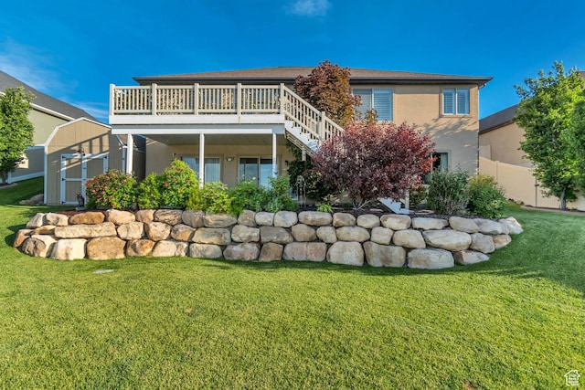 3547 E Jacobs Way, Eagle Mountain, UT 84005 - rear view of house with stucco siding, stairs, and a deck