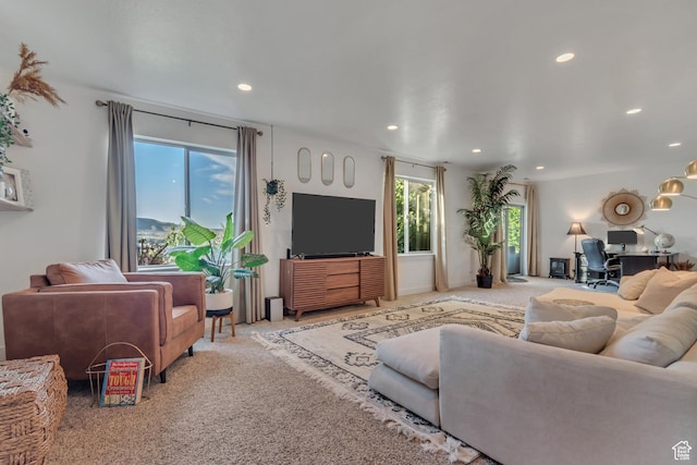 3547 E Jacobs Way, Eagle Mountain, UT 84005 - carpeted living room with a desk and recessed lighting