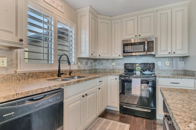 3547 E Jacobs Way, Eagle Mountain, UT 84005 - kitchen featuring black appliances, a sink, dark wood-type flooring, and decorative backsplash