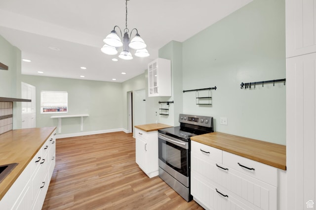 41 S 100 E, Heber City, UT 84032 - kitchen with wood counters, stainless steel range with electric cooktop, a chandelier, light wood-style floors, and recessed lighting
