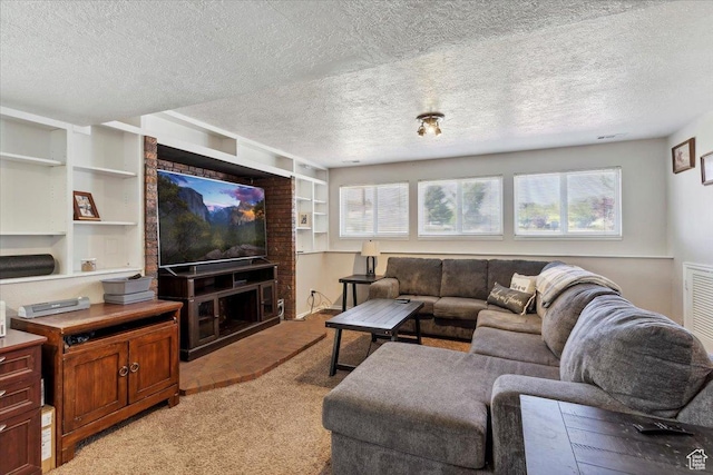 1602 E 2550 N, Layton, UT 84040 - living room featuring light colored carpet, a textured ceiling, and built in shelves