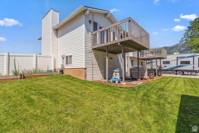 1602 E 2550 N, Layton, UT 84040 - back of house with a deck, a yard, and a chimney