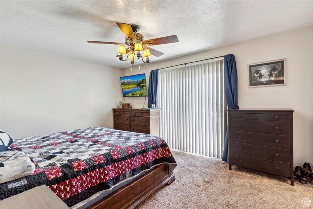 1602 E 2550 N, Layton, UT 84040 - bedroom featuring carpet, a textured ceiling, and a ceiling fan