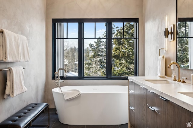 8200 E Royal St Unit 50, Deer Valley, UT 84060 - bathroom featuring healthy amount of natural light, a freestanding tub, and double vanity