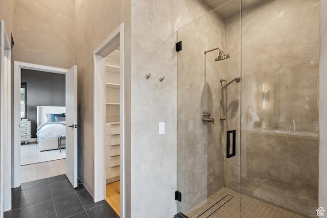 8200 E Royal St Unit 50, Deer Valley, UT 84060 - full bath featuring a shower stall, connected bathroom, a walk in closet, and tile patterned floors
