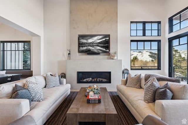 8200 E Royal St Unit 50, Deer Valley, UT 84060 - living room with a high ceiling and a glass covered fireplace