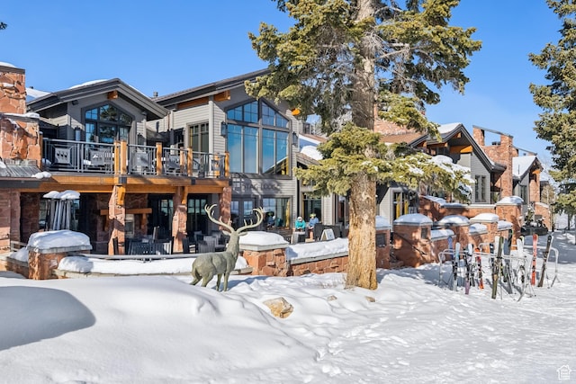 8200 E Royal St Unit 50, Deer Valley, UT 84060 - snow covered house with a wooden deck