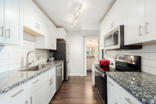 123 E 2nd Ave N Unit 1211, Salt Lake City, UT 84103 - kitchen with appliances with stainless steel finishes, a sink, dark wood-type flooring, stone counters, and white cabinetry