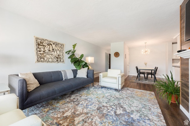 123 E 2nd Ave N Unit 1211, Salt Lake City, UT 84103 - living room featuring wood finished floors, a chandelier, and baseboards