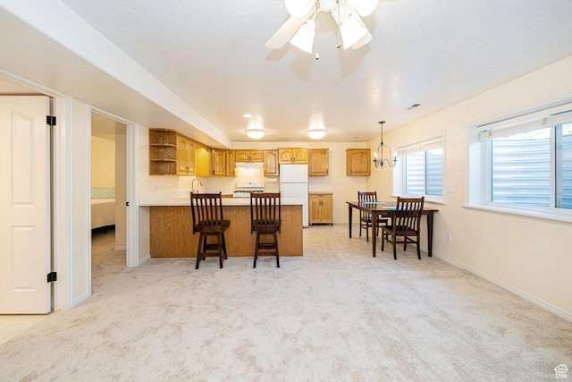 2678 E 25 S, Layton, UT 84040 - kitchen featuring white appliances, a peninsula, open shelves, and light colored carpet
